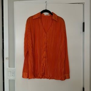 Showpo Beca plisse orange long sleeve top